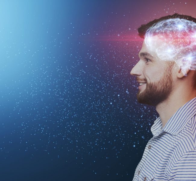 Upgrade your brain, education concept. Side view portrait of smiling millennial man with shining brain looking away at copy space on open space background, panorama, collage